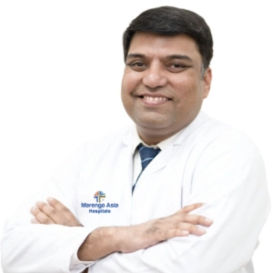 Dr. Manish Saxena