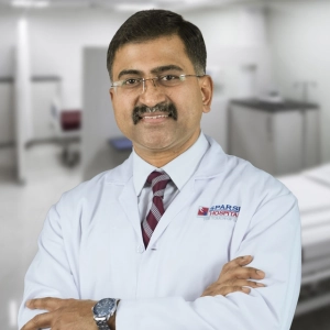 Dr. Mahesh Channappa